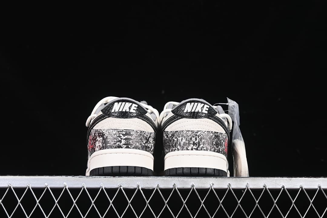 Rear view of both sneakers showing patterned heel panels