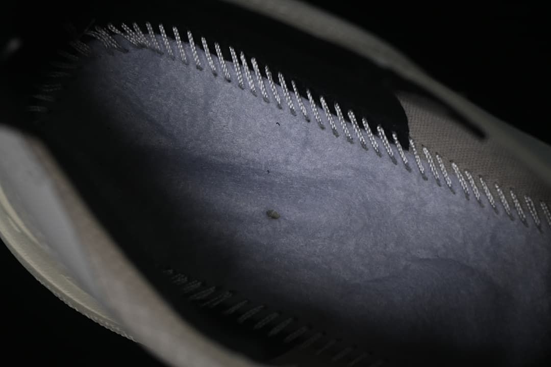 Close-up view inside the shoe showing the lining and stitched construction