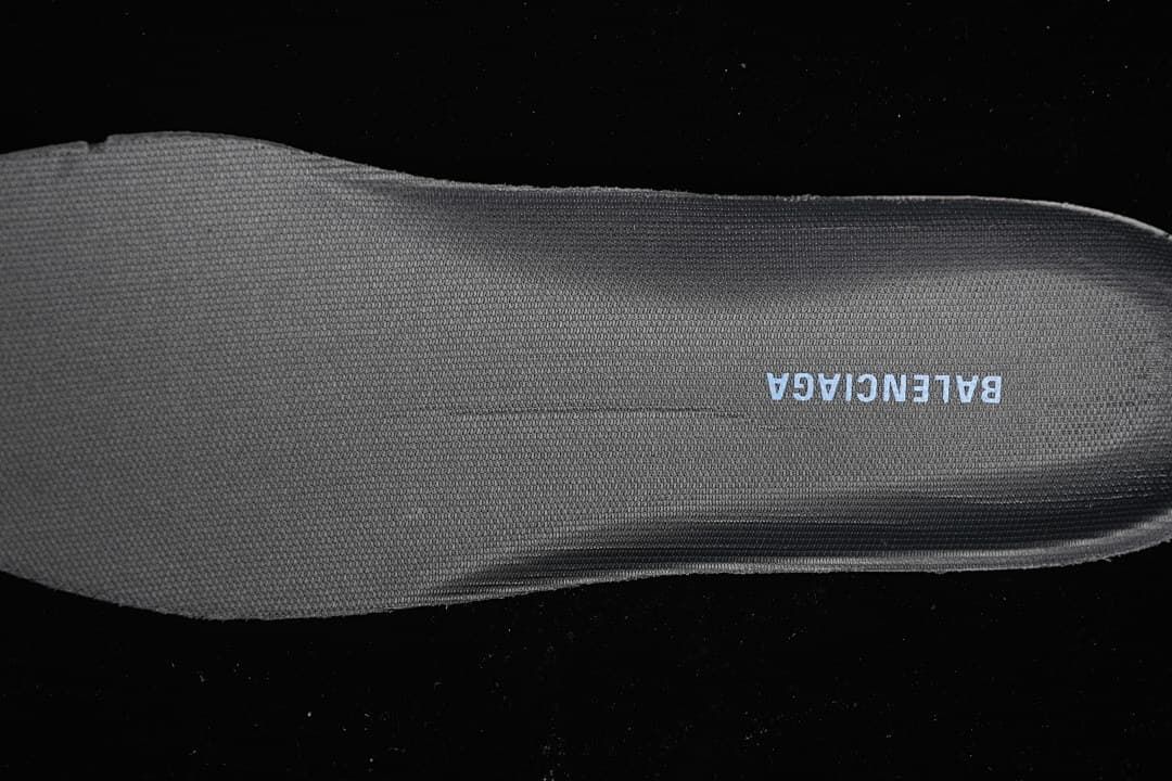 Close-up of the dark textured insole with Balenciaga lettering.
