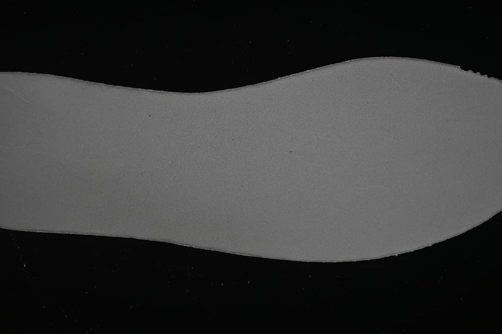 Close-up view of the sneaker's pale footbed