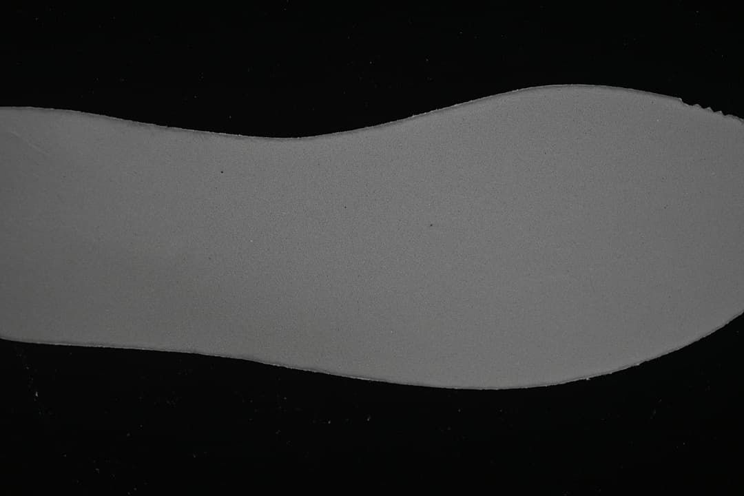 Close-up view of the sneaker's pale footbed