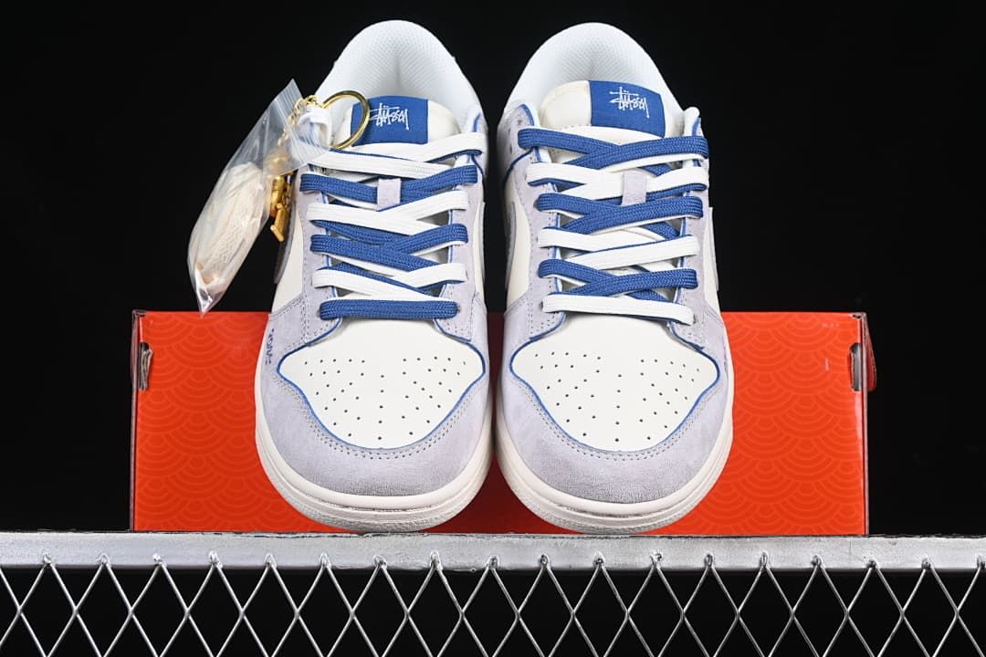 Front view of the pair showing perforated toe boxes and contrasting laces