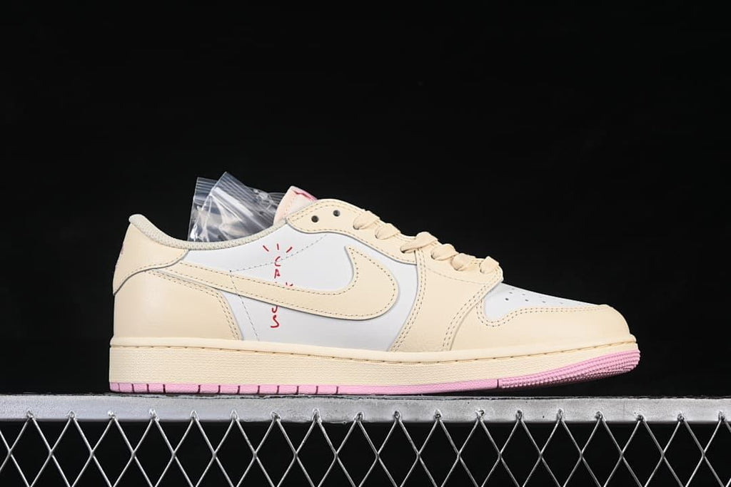 Side profile showing the cream Swoosh and red side lettering