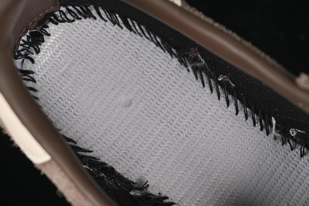 Close-up of the inside construction beneath the shoe lining.