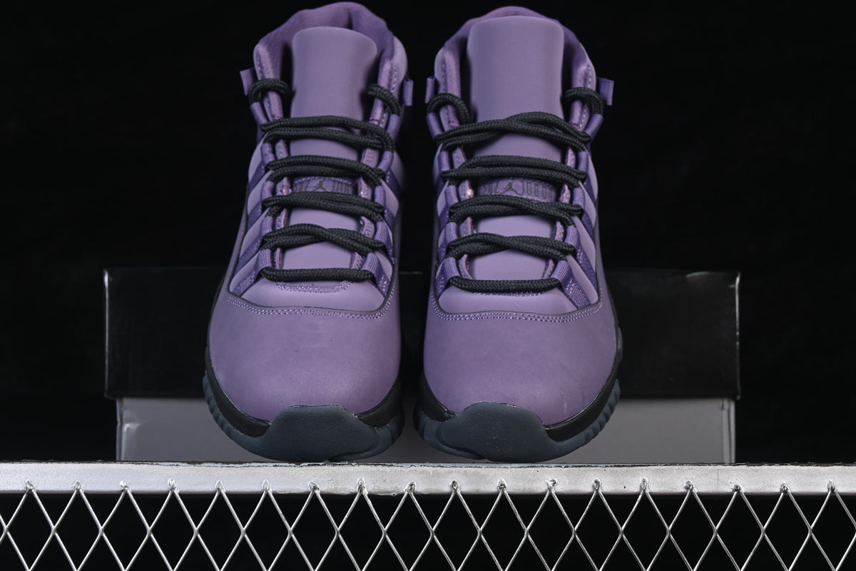 Front view of the pair of purple high-top sneakers with black laces.