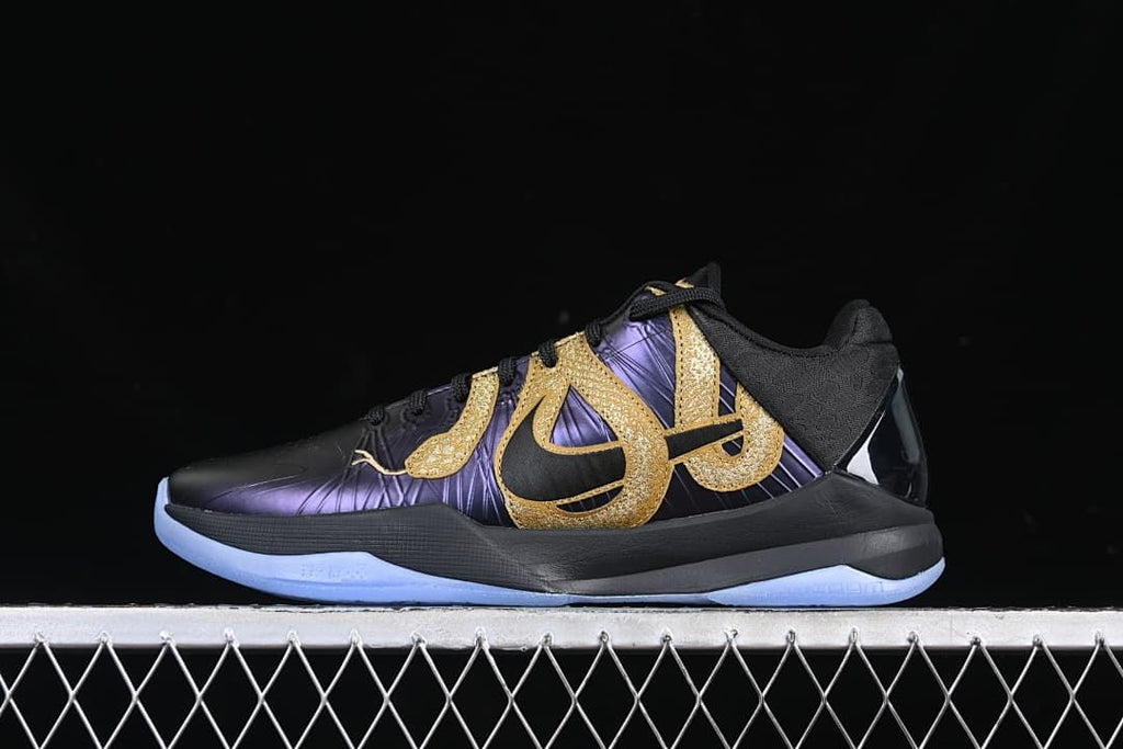Side view of a black, purple, and gold Kobe V Protro low-top basketball shoe