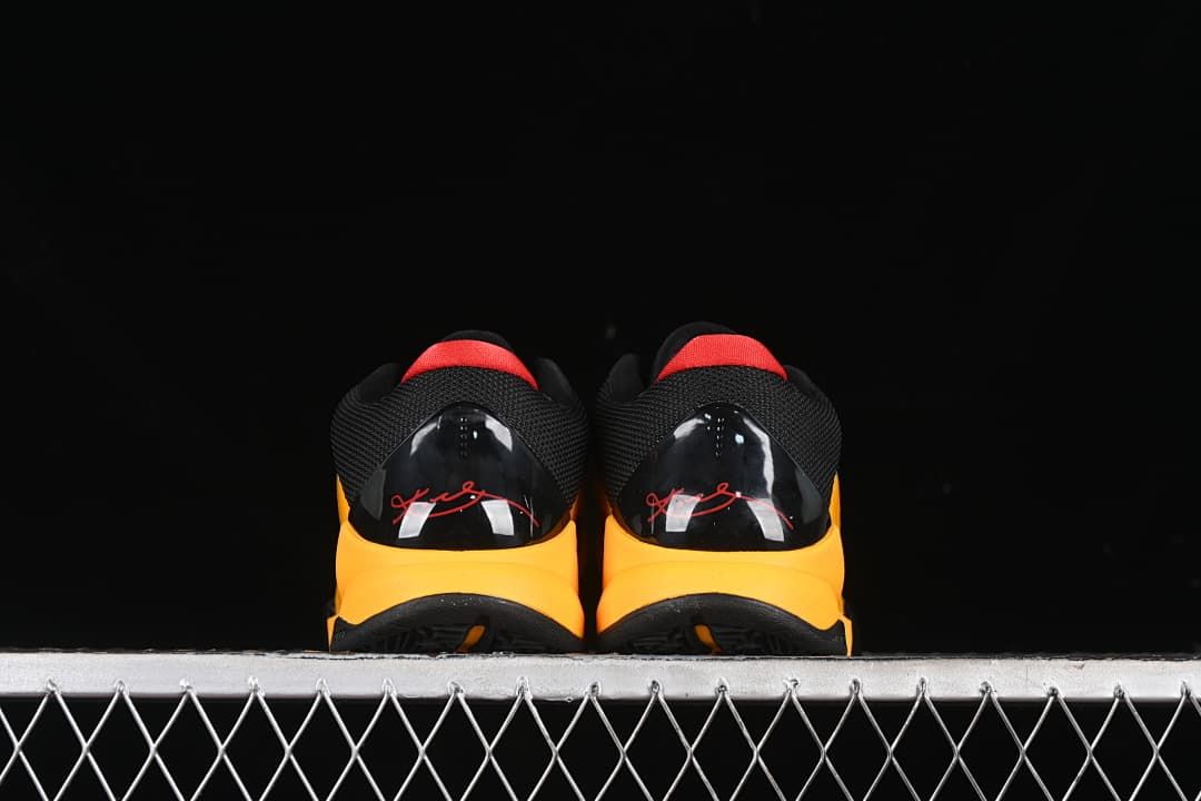 Rear view of both shoes with red heel accents