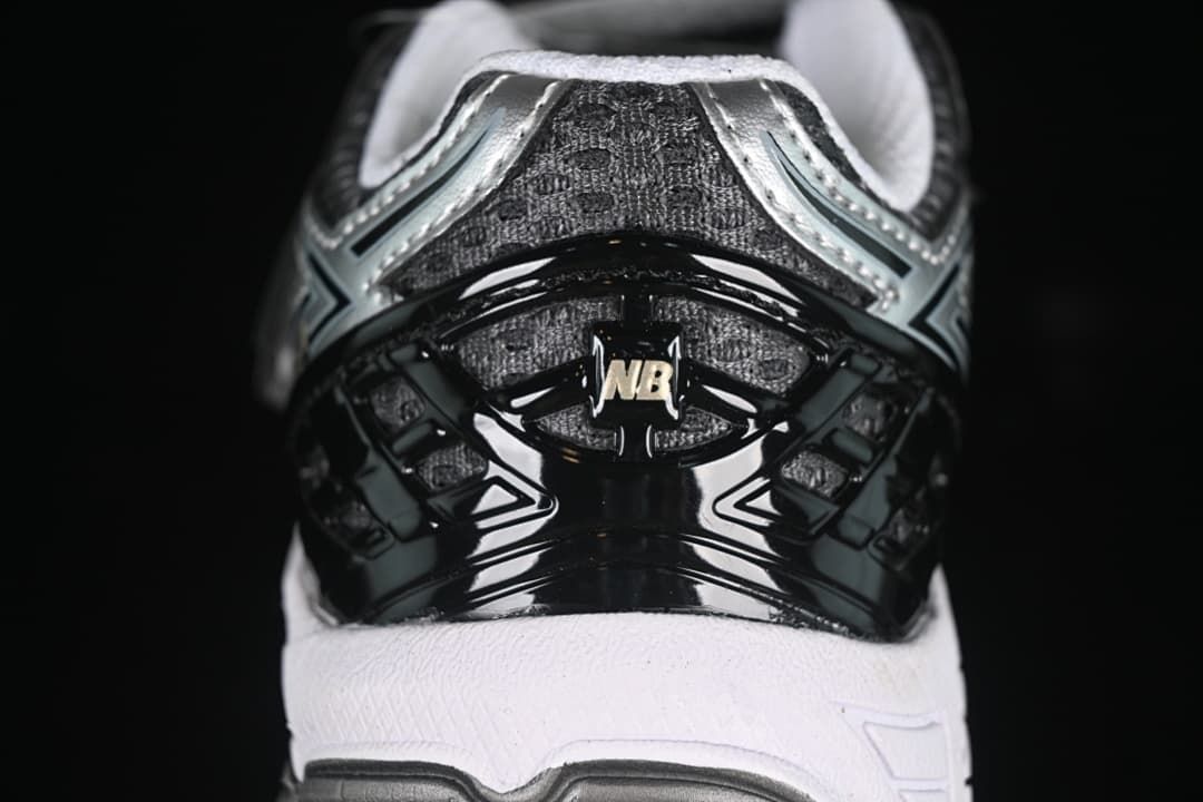 Rear view of the sneaker showing its black heel detail and white midsole