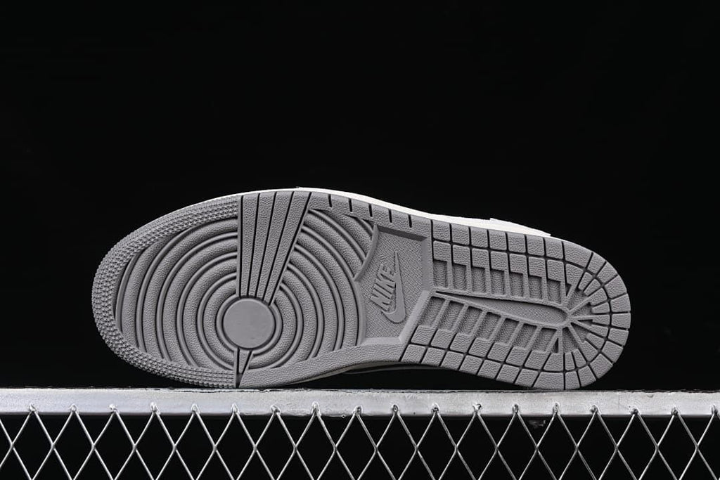 Underside view showing the gray tread pattern