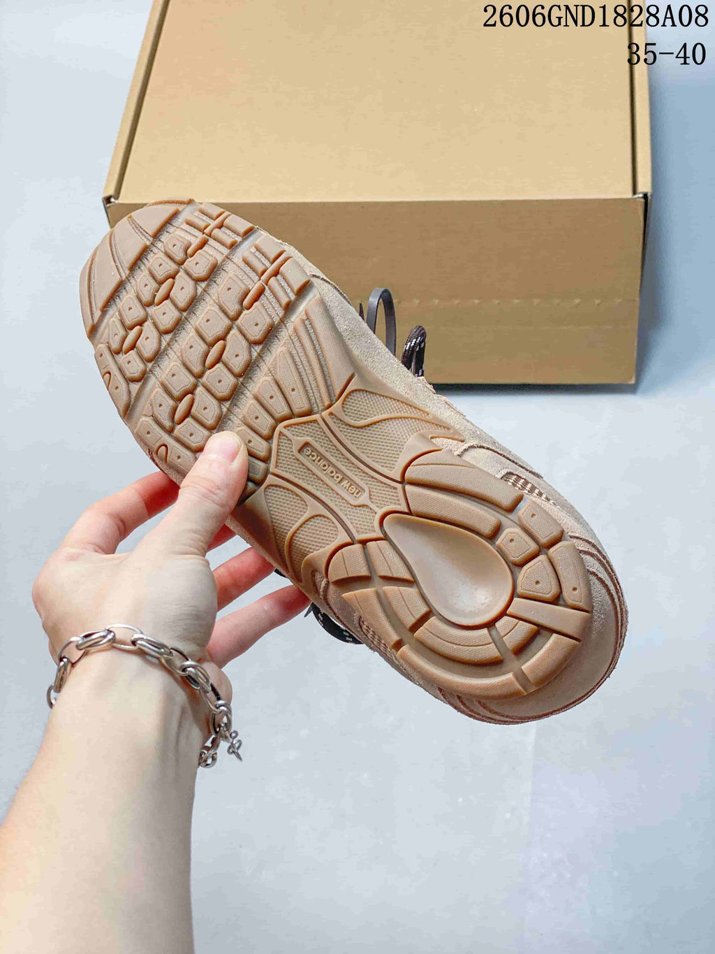 Close-up of the sneaker's textured gum-tone outsole.