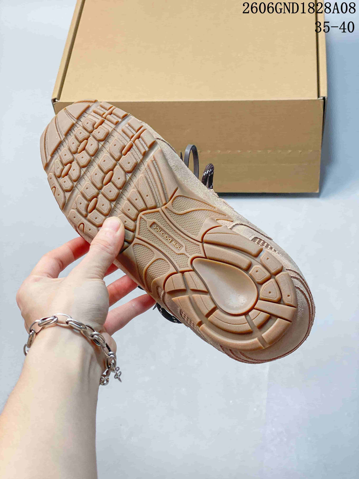Close-up of the sneaker's textured gum-tone outsole.