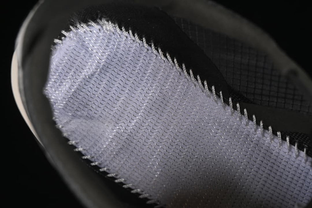 Close-up of the shoe's inner lining and upper construction