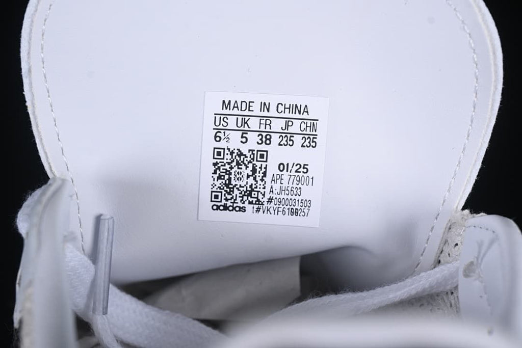 Shoe size label showing EU 38 and model JH5633