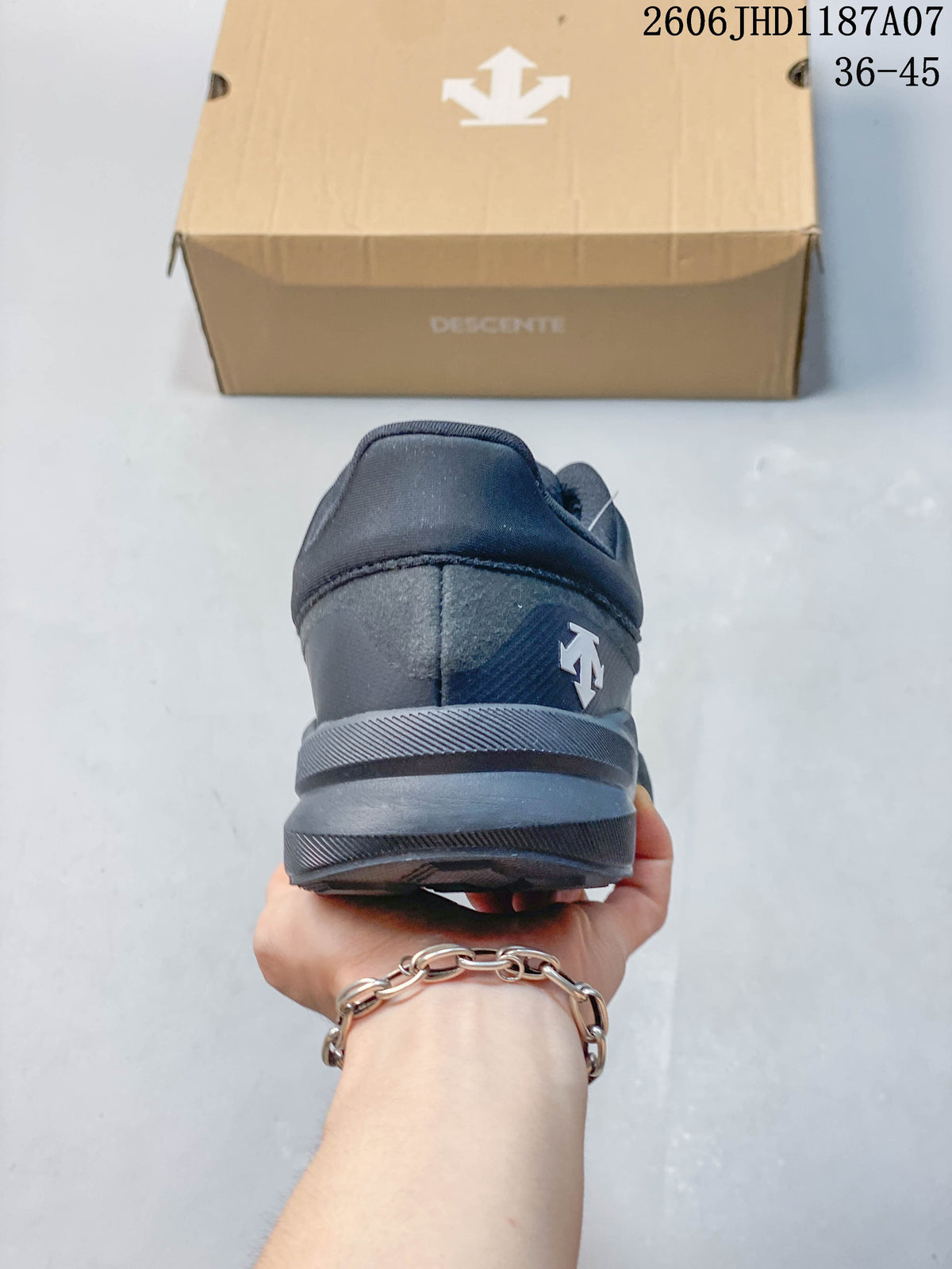 Rear view showing the heel design and Descente logo