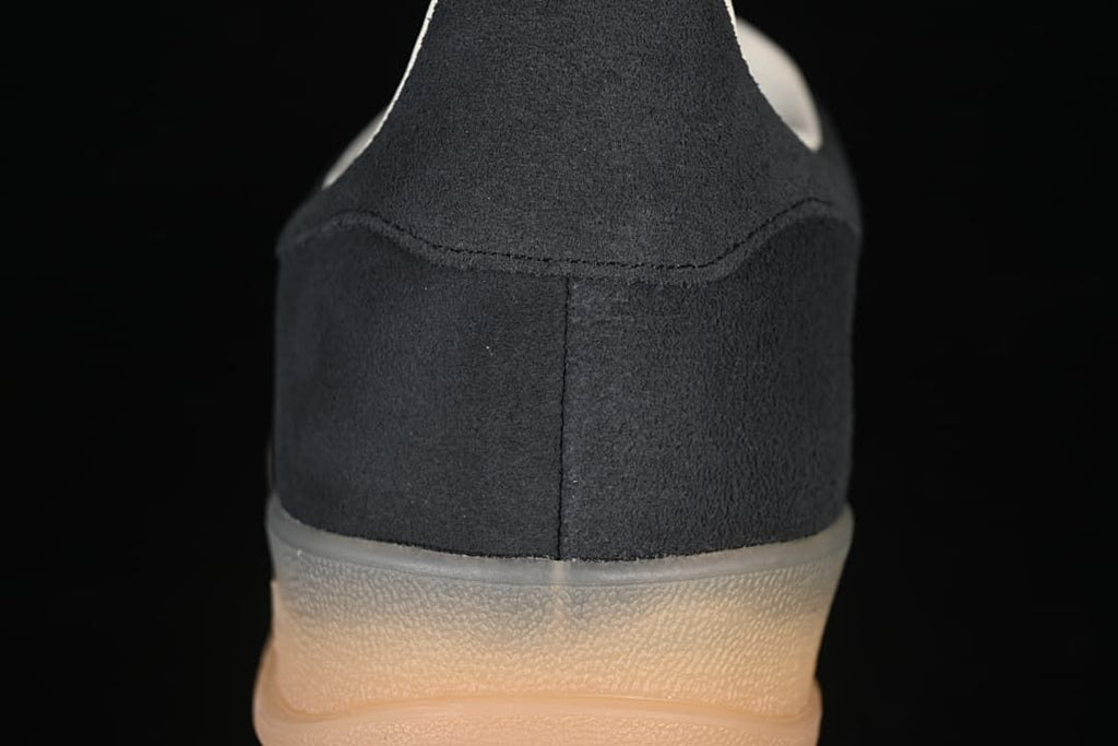 Rear view showing the black heel and gum-colored outsole.