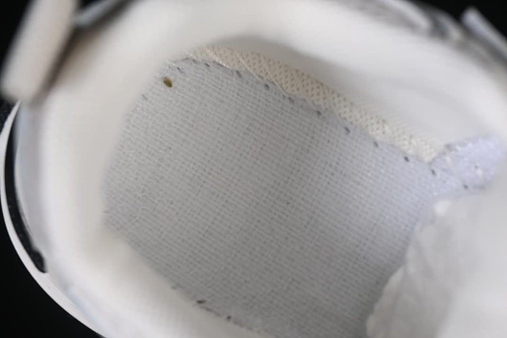 Close-up of the sneaker’s mesh-look inner upper