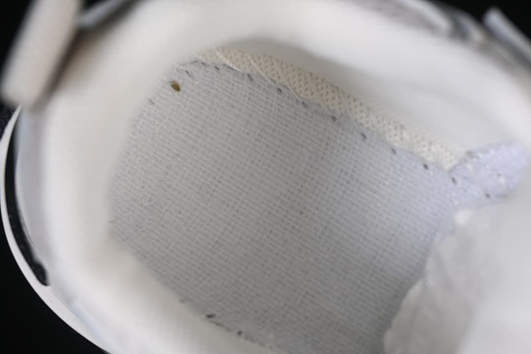 Close-up of the sneaker’s mesh-look inner upper