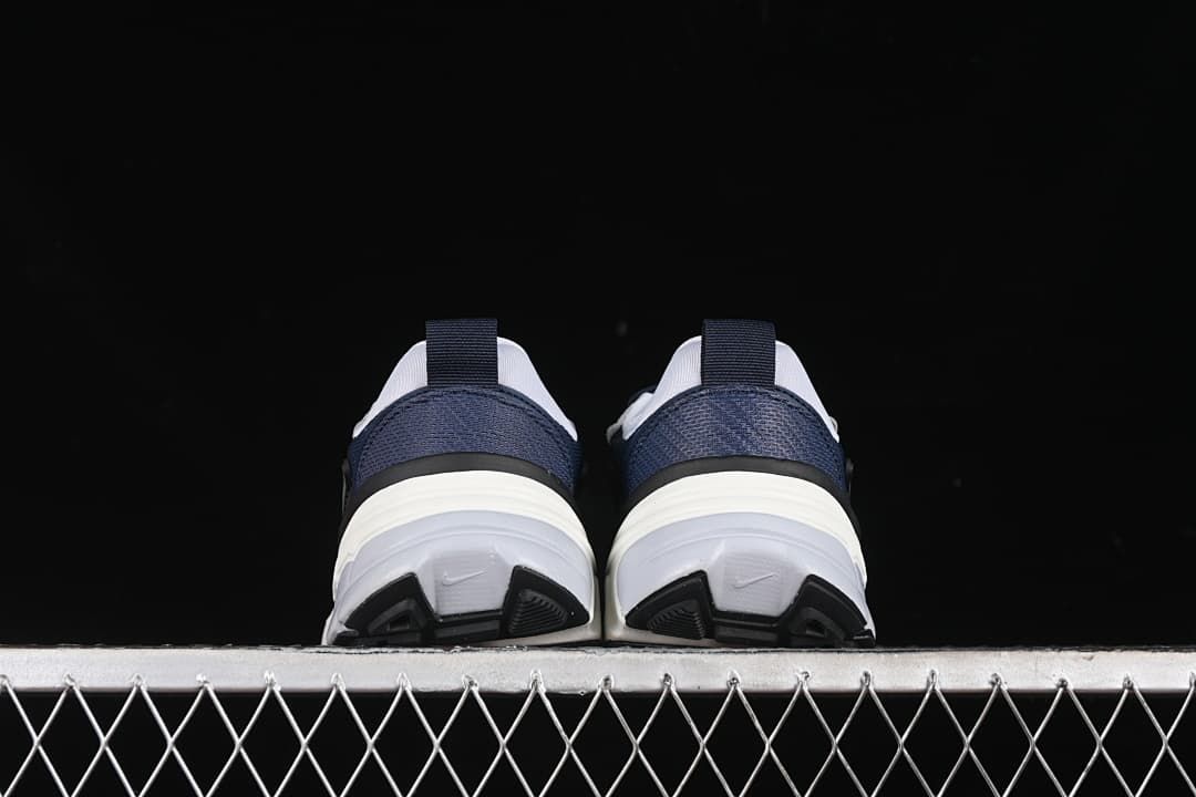 Rear view of both sneakers and their layered soles