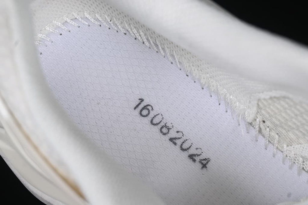 Close-up of stitching and interior shoe label