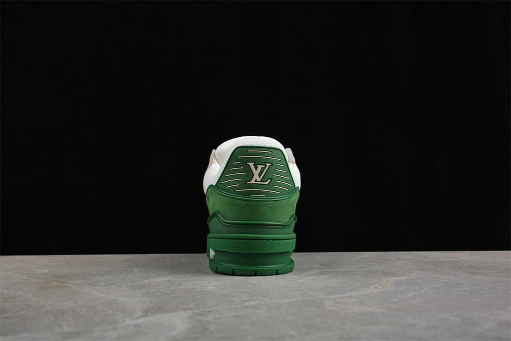 Rear view of the green sneaker with a logo panel