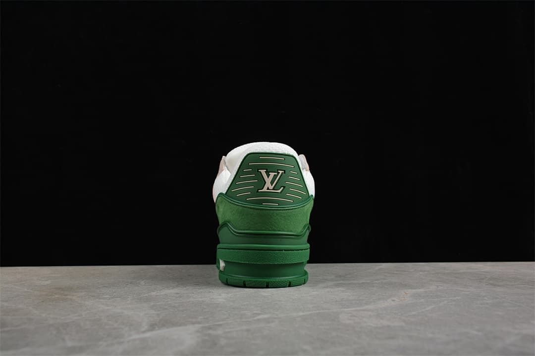 Rear view of the green sneaker with a logo panel