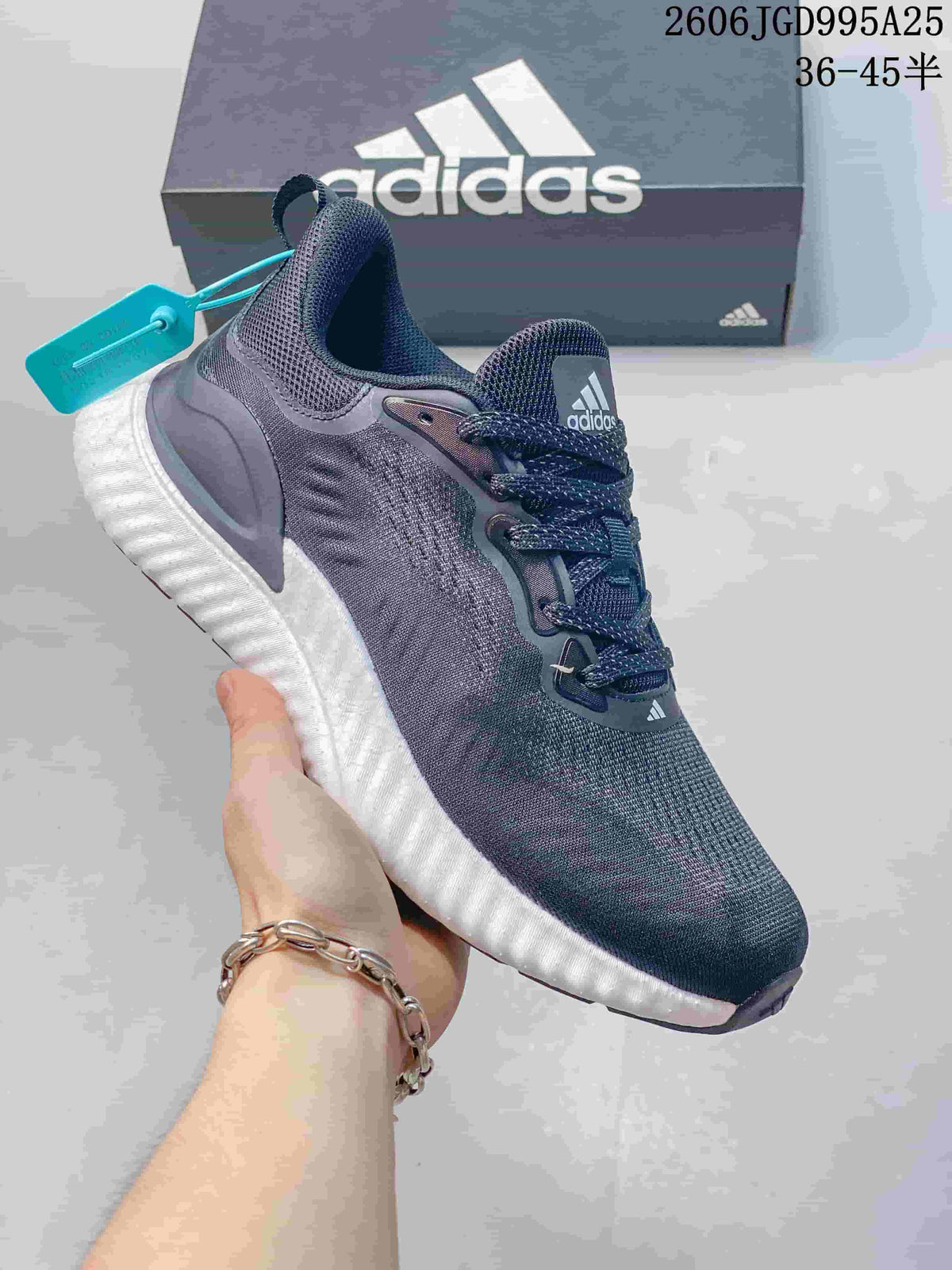 Dark gray adidas Switch FWD M sneaker with turquoise detailing and a ridged white sole