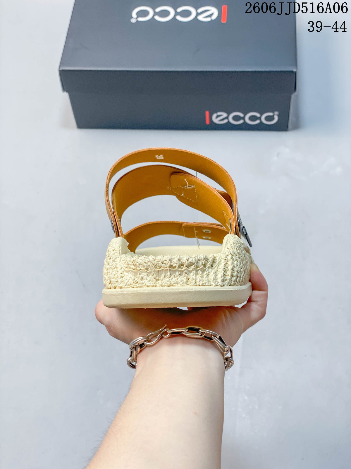 Rear view showing the sandal heel, straps, and textured cream sole.