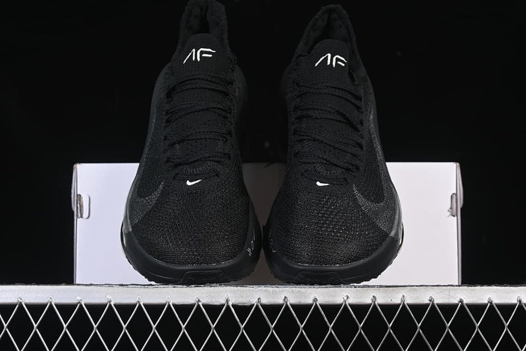 Front view of the pair of black running shoes