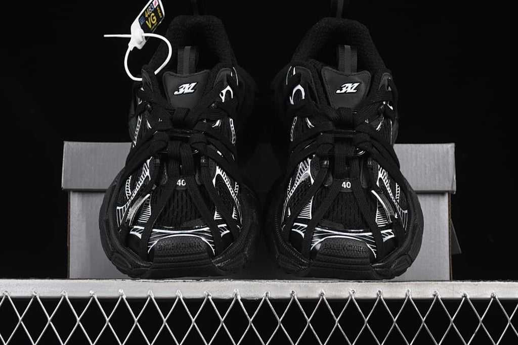 Front view of the pair placed on a shoe box.