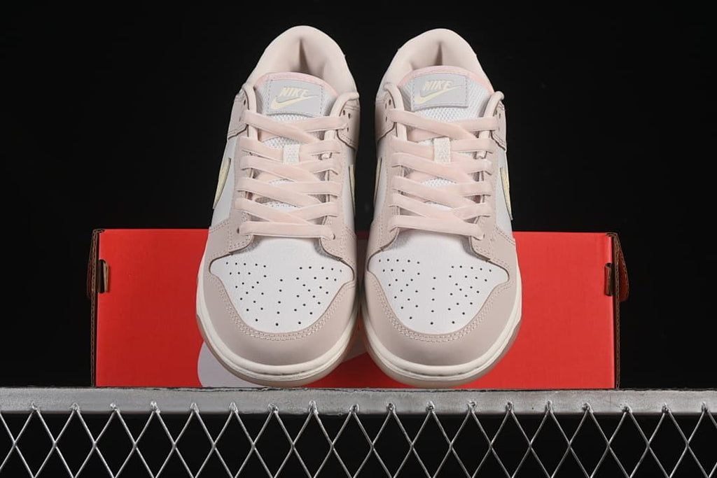 Front view of the pair displayed on a red shoebox