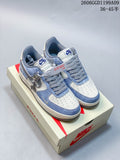 Pair of pale blue and off-white Nike Air Force 1 Low-style sneakers with patterned laces and a decorative charm.