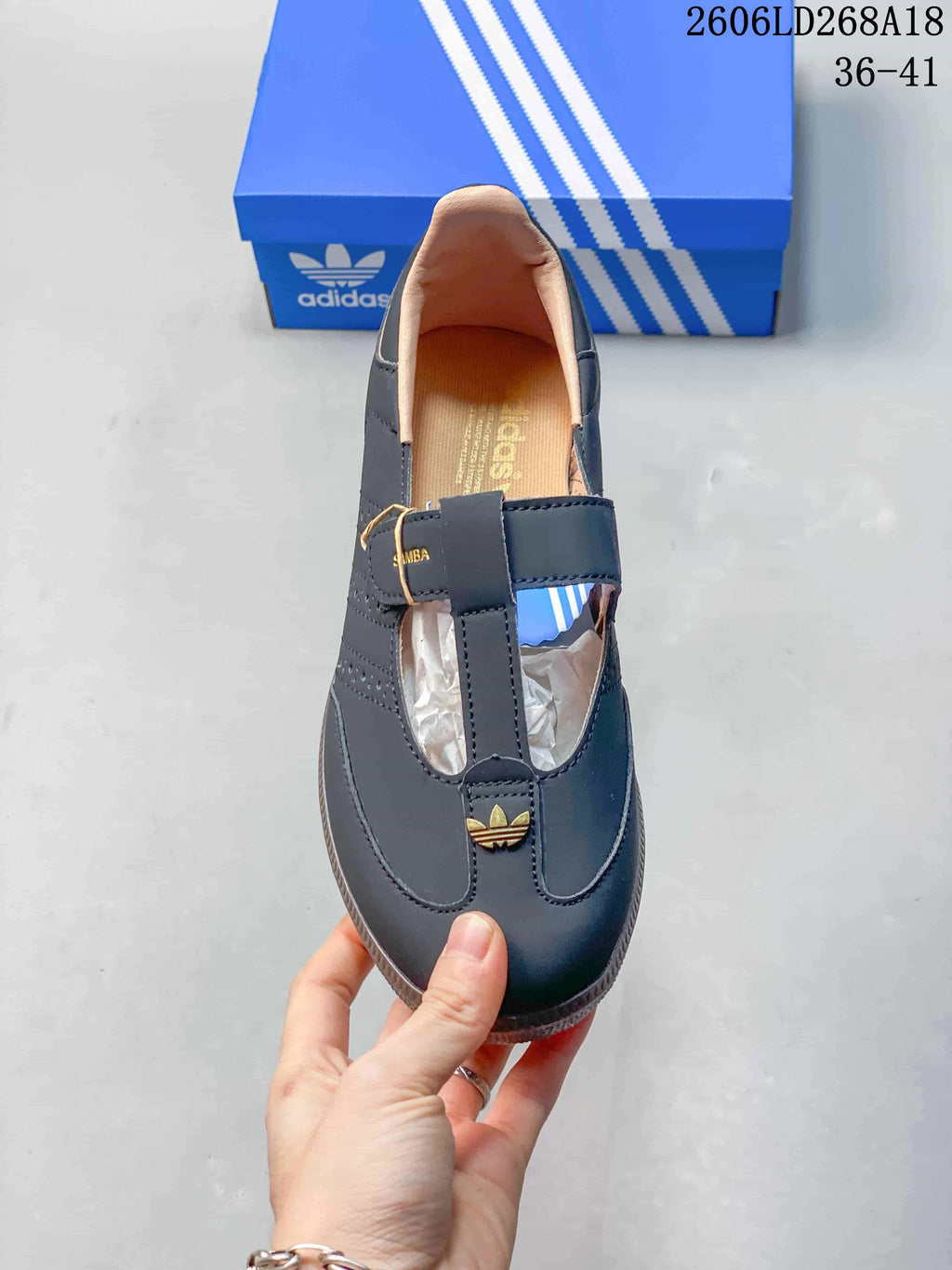 Top view of a dark gray Samba Jane shoe showing its T-strap and buckle