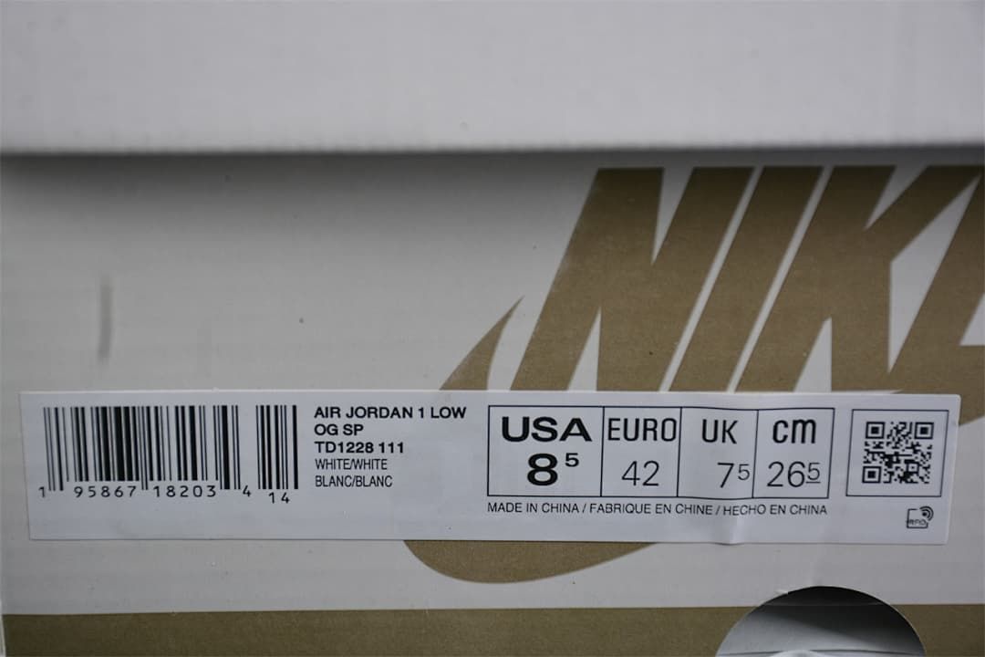 Shoe box label for Air Jordan 1 Low OG SP, style TD1228 111, showing EU 42