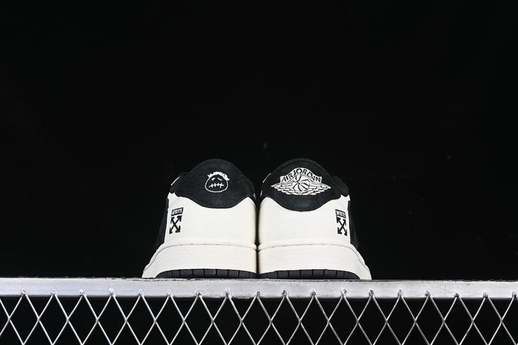 Rear view of both shoes with contrasting heel details.