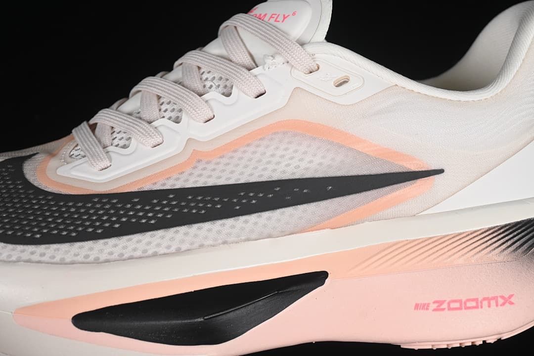 Close-up of the side Swoosh, upper, and sculpted sole