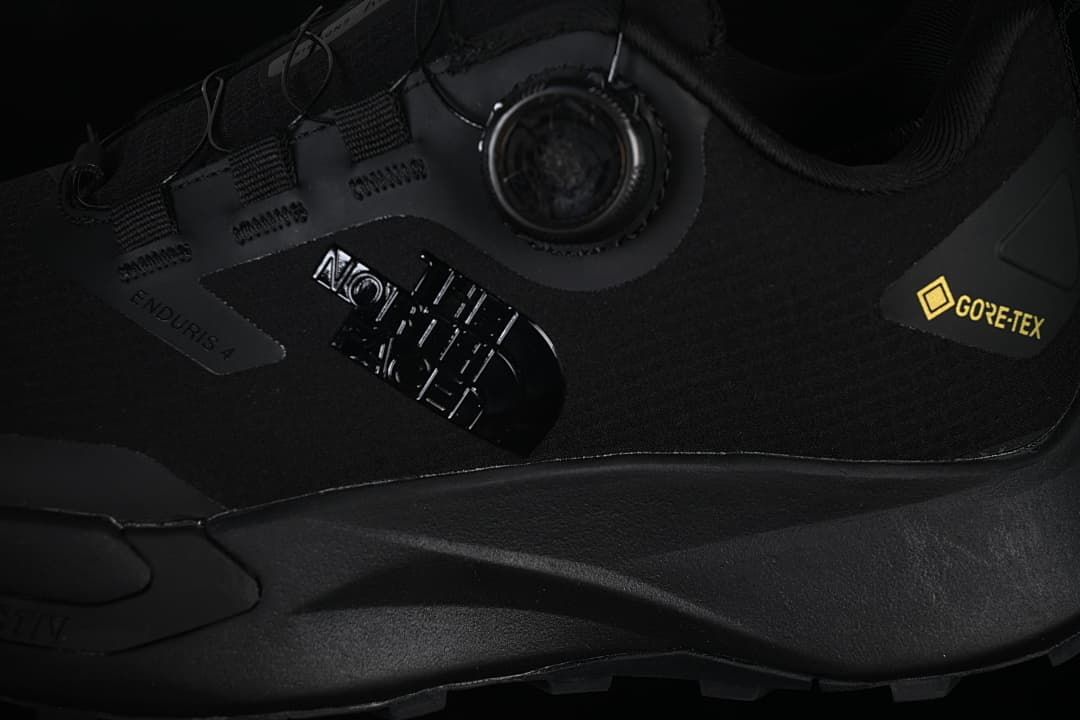 Close-up of the side branding, dial closure, and GORE-TEX marking.
