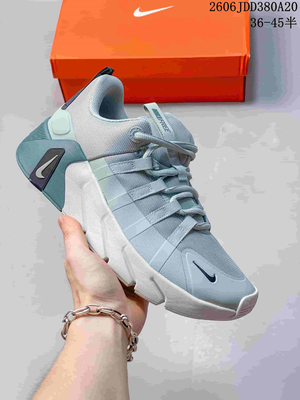 Blue-gray Nike Free Metcon 7 shoe with white sole