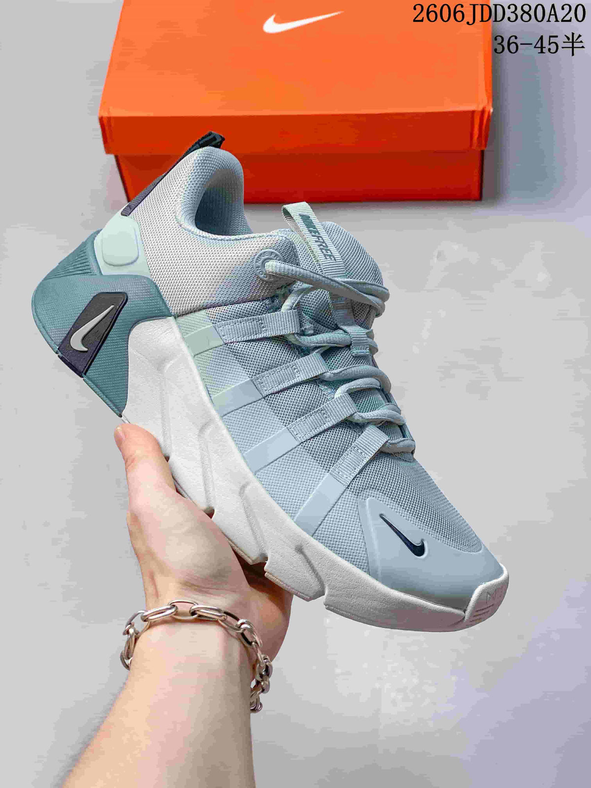 Blue-gray Nike Free Metcon 7 shoe with white sole