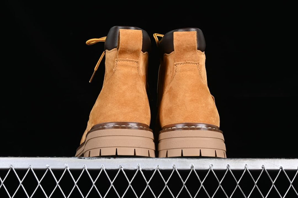 Rear view of the pair showing heel pull tabs and soles