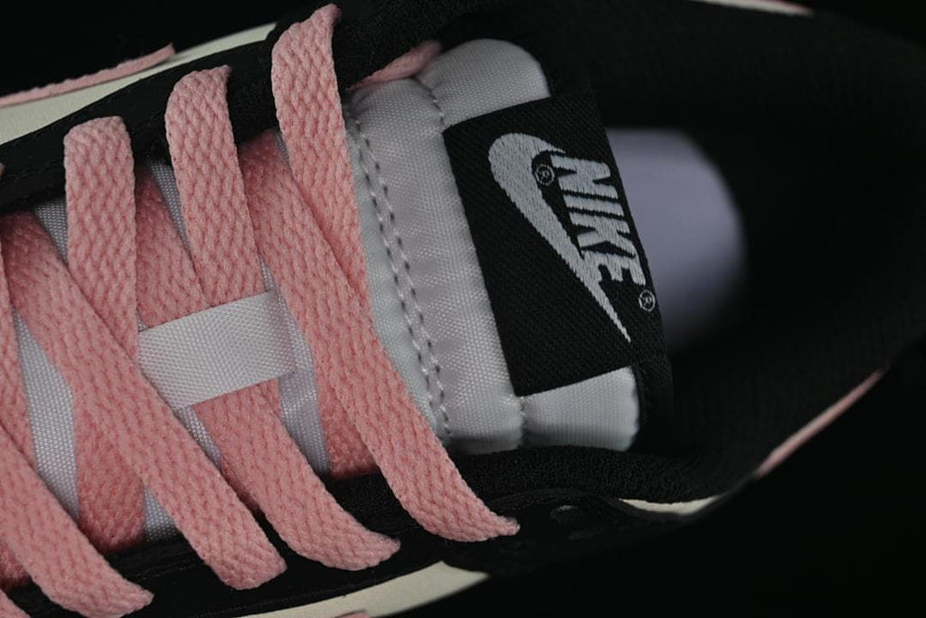 Close-up of pink laces and tongue branding