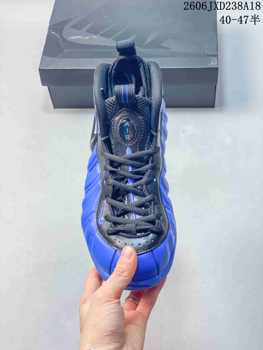 Top view of the lace-up front and tongue of a Nike Foamposite Pro shoe