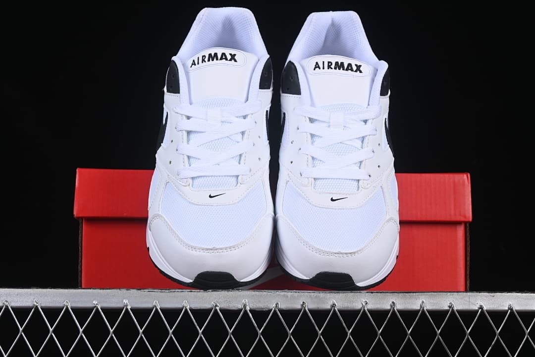 Front view of the pair with white uppers and black accents.