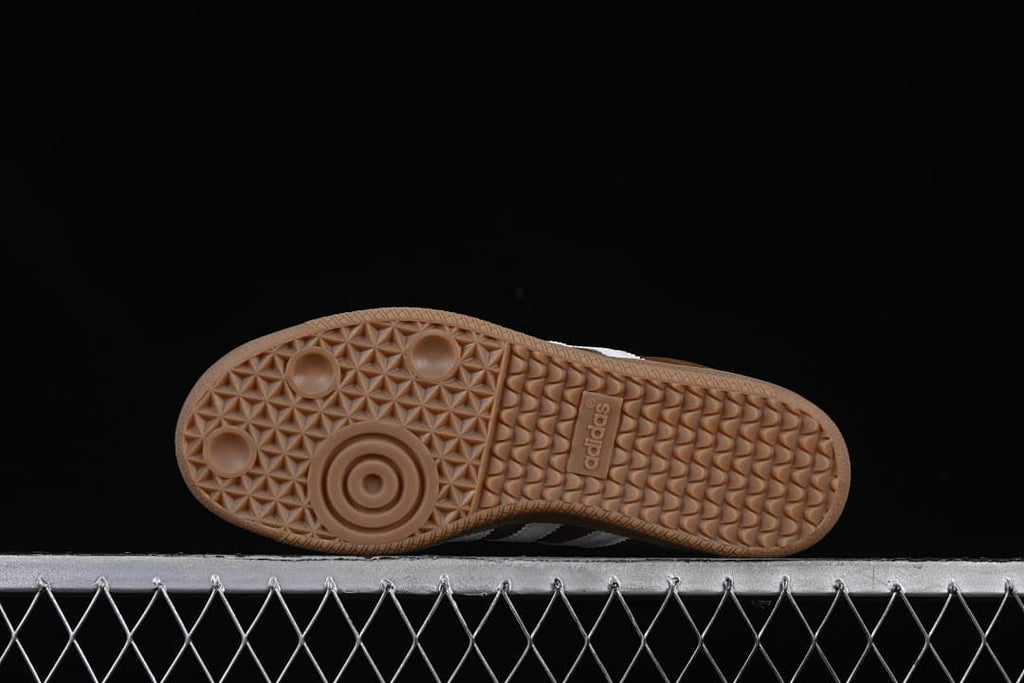 Underside view of the gum-colored outsole with textured tread.