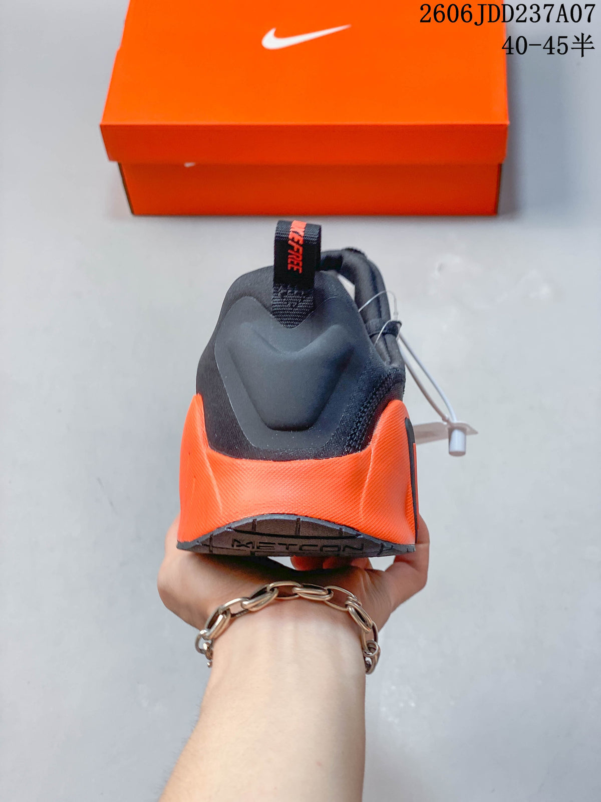 Rear view showing the orange heel panel and pull tab