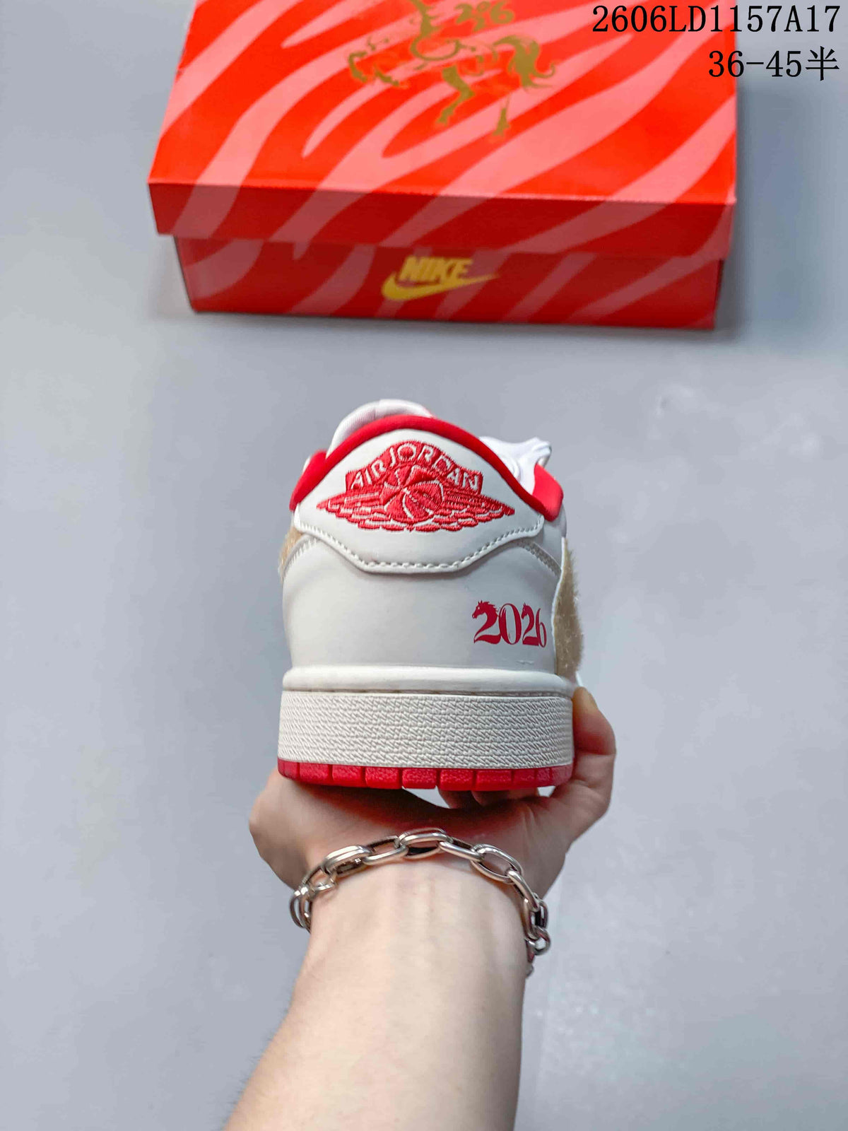 Rear view showing heel embroidery and red outsole