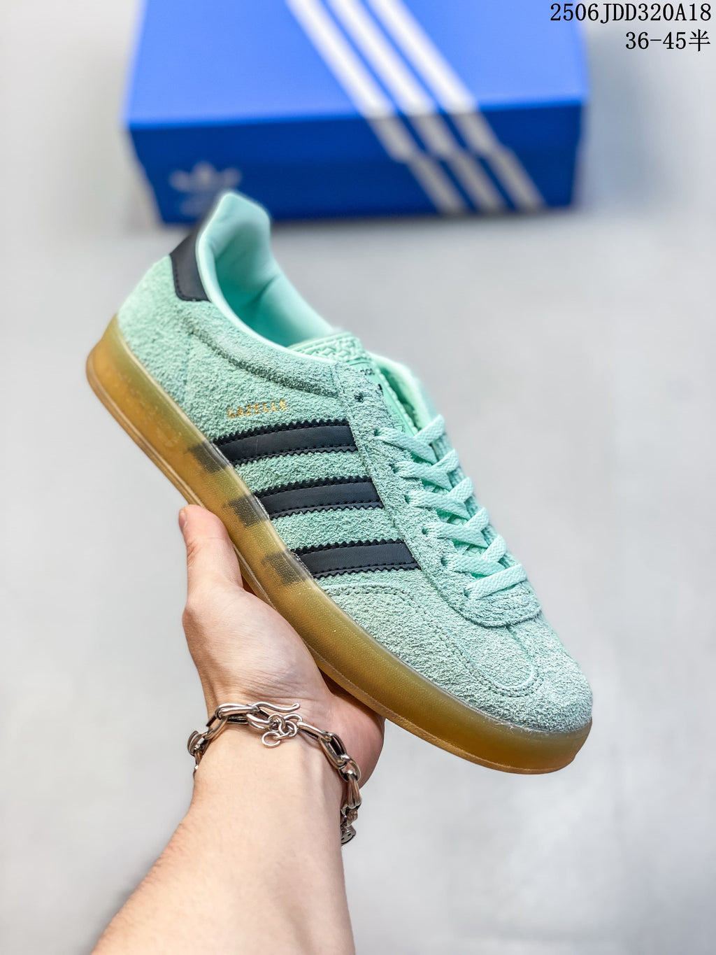 Mint green Adidas Gazelle 90 sneaker with dark stripes and a gum-style sole