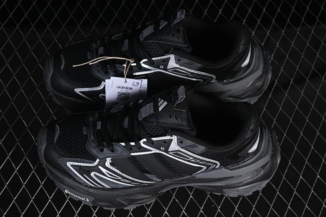 Pair of black and grey adidas XLG Storm Edge sneakers