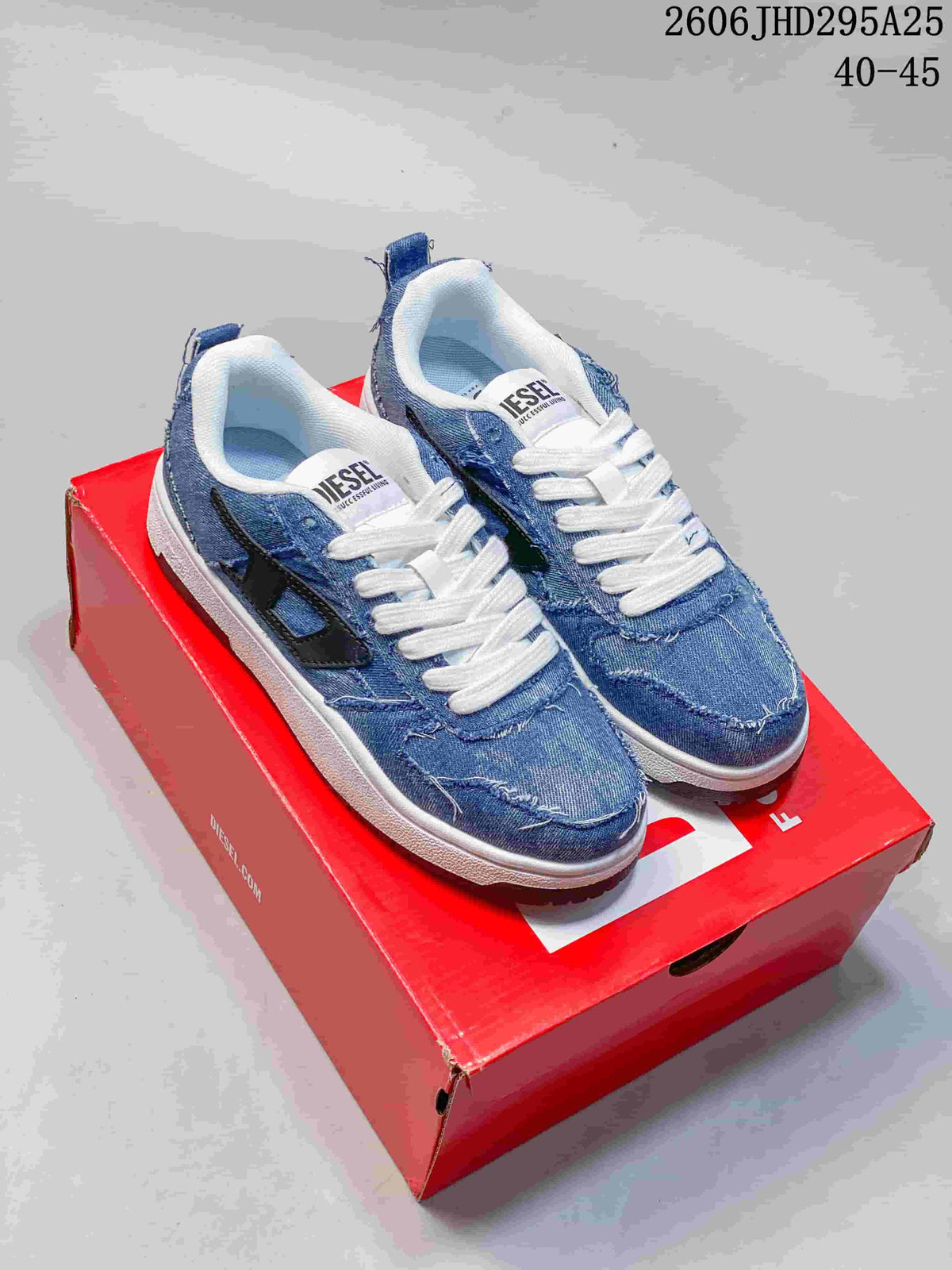Blue distressed denim-style Diesel low-top sneakers on a red shoebox