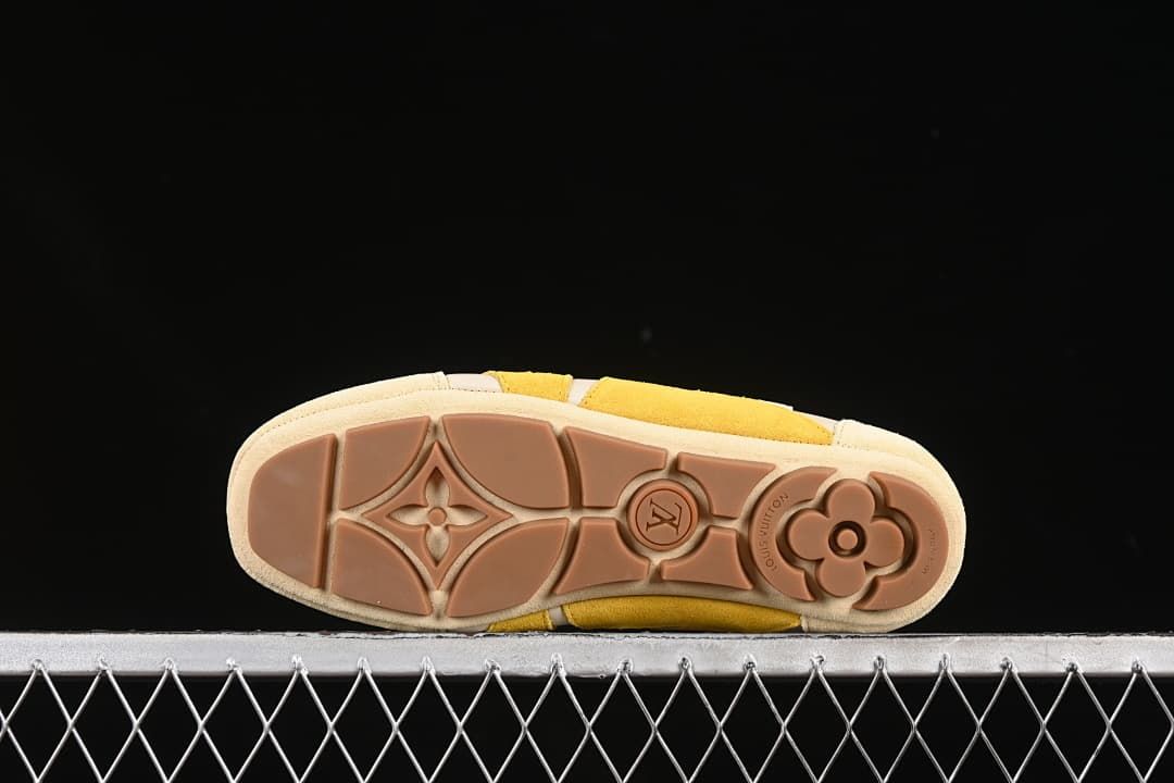 Underside view showing the patterned brown outsole