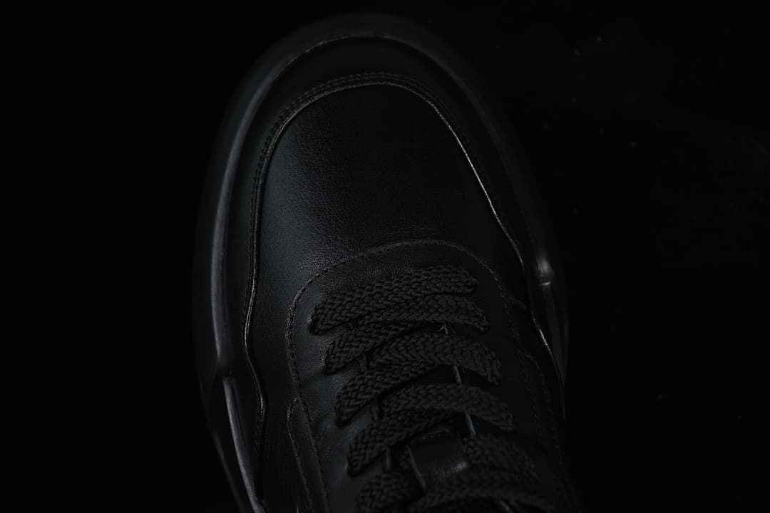 Top view of the sneaker toe and black laces